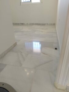 Cleaned marble floor by Sergio Facility Service.