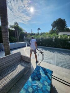 Pool cover cleaning by Sergio Facility Services
